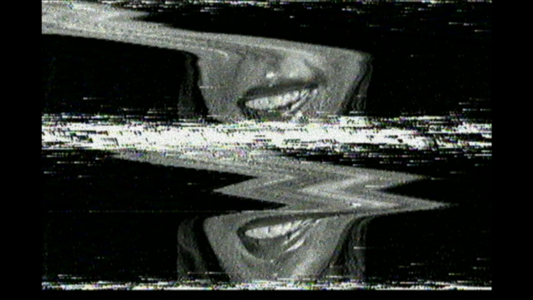 Still from The Joyless Economy